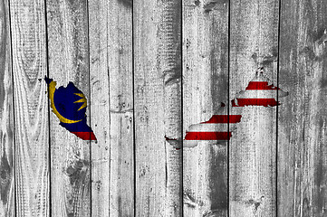 Image showing Map and flag of Malaysia on weathered wood
