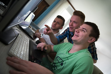 Image showing a group of graphic designers at work