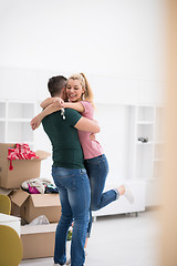 Image showing happy Young couple moving in new house