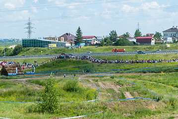 Image showing Athletes line on track after start. Tyumen. Russia