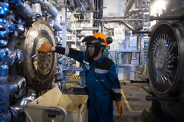 Image showing Industrial mechanic cleaning extruder machine