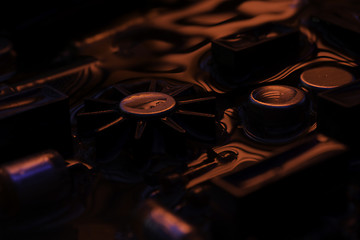 Image showing vintage circuit board with dark red and blue reflection