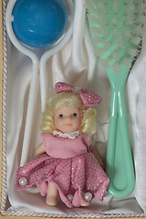 Image showing  Doll brush rattle close to