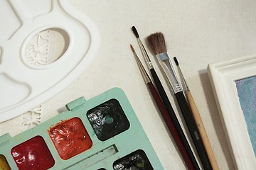 Image showing paints brushes on canvas