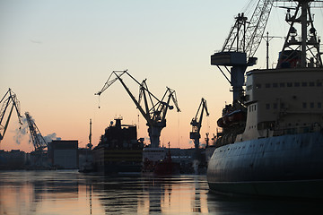 Image showing  silhouettes of ships and portal cranes