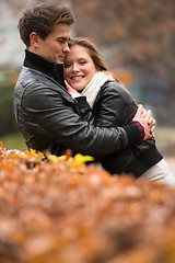 Image showing Autumn portrait of attractive happy couple