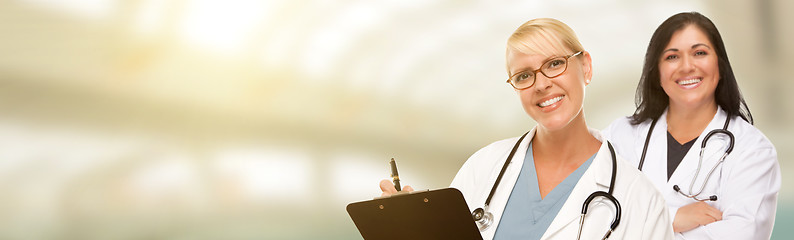 Image showing Caucasian and Hispanic Female Doctors, Nurses or Pharmacists wit