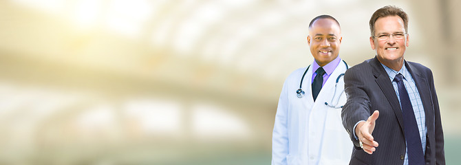 Image showing Caucasian Businessman and African American Male Doctor, Nurse or