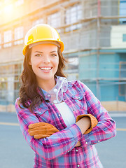 Image showing Portrait of Young Female Construction Worker Wearing Gloves, Har