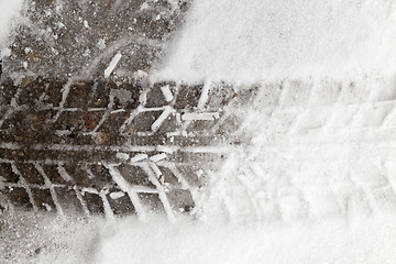 Image showing traces of the car on snow