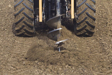 Image showing Drilling Hole with Tractor