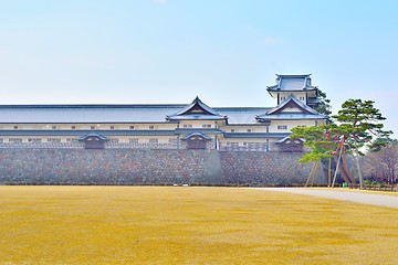 Image showing Kanazawa castle walls, tower and pine tree in Ishikawa