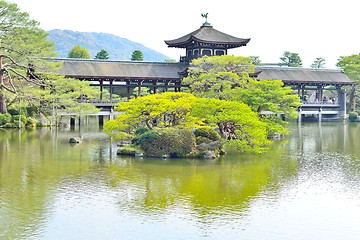 Image showing Old roofed bridge in a garden at Heian Jingu of Kyoto