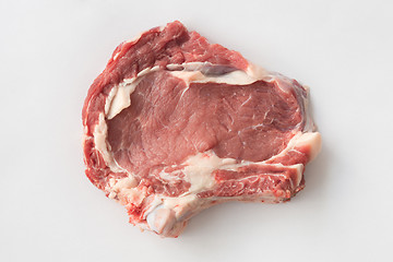 Image showing A piece of beef with bone on a white background