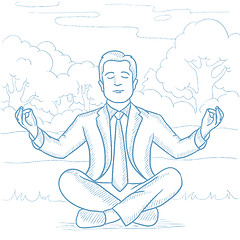 Image showing Businessman meditating in lotus pose on the beach.