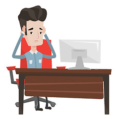 Image showing Stressful employee sitting at workplace.