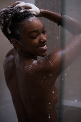 Image showing African American woman in the shower