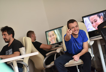 Image showing a group of graphic designers at work