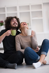 Image showing young couple in their new home