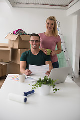 Image showing Young couple moving in a new home