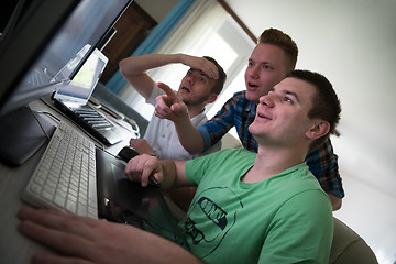 Image showing a group of graphic designers at work