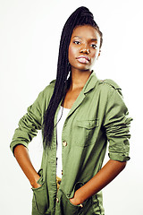 Image showing young pretty african-american girl posing cheerful emotional on white background isolated, lifestyle people concept