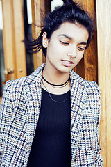 Image showing young pretty student teenage indian girl in doors happy smiling, having fun, lifestyle people concept