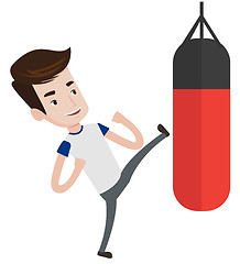 Image showing Man exercising with punching bag.