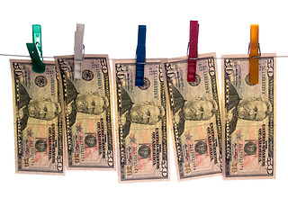 Image showing Wet Dollars on Clothesline