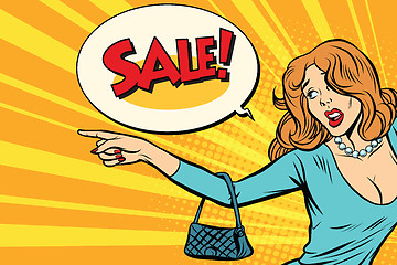 Image showing The woman indicates sales