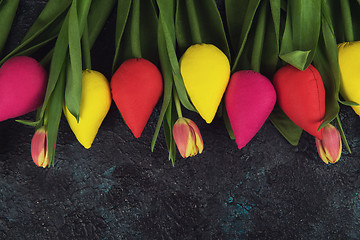 Image showing Handmade and real tulips on darken