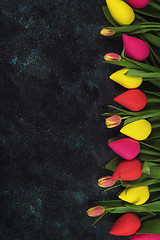 Image showing Handmade and real tulips on darken