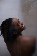 Image showing African American woman in the shower