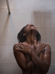 Image showing African American woman in the shower