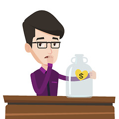 Image showing Bankrupt businessman looking at empty glass jar.