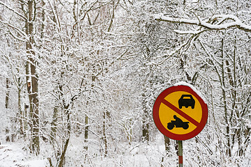 Image showing Roadsign in snowy in a snow covered forest