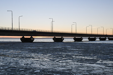 Image showing Ice floe by a bridge detail