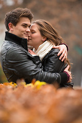 Image showing Autumn portrait of attractive happy couple