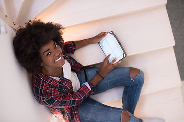 Image showing black woman using her electronic tablet