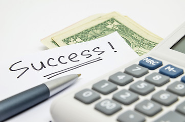 Image showing Calculator, money and success word