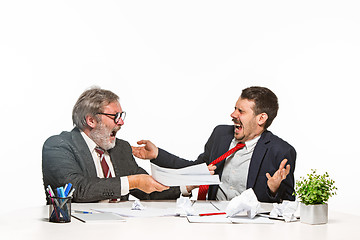 Image showing The two colleagues working together at office on white background.