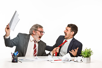 Image showing The two colleagues working together at office on white background.