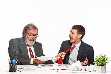 Image showing Concept - corruption. Businessman in a suit taking a bribe