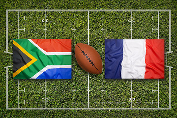 Image showing South Africa vs. France flags on rugby field