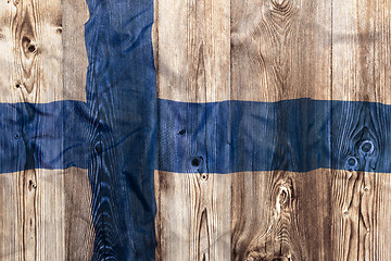 Image showing National flag of Finland, wooden background