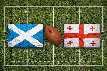 Image showing Scotland vs. Georgia flags on rugby field