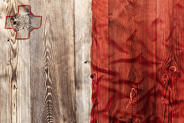 Image showing National flag of Malta, wooden background