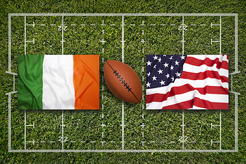 Image showing Ireland vs. Scotland\r\rIreland vs. USA flags on rugby field