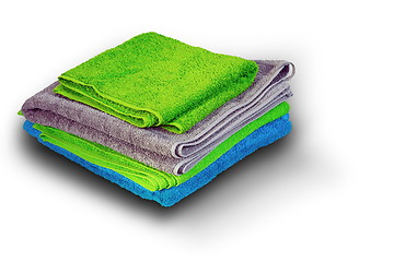 Image showing pile of colorful towel on white