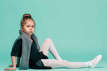 Image showing The little balerina dancer on blue background